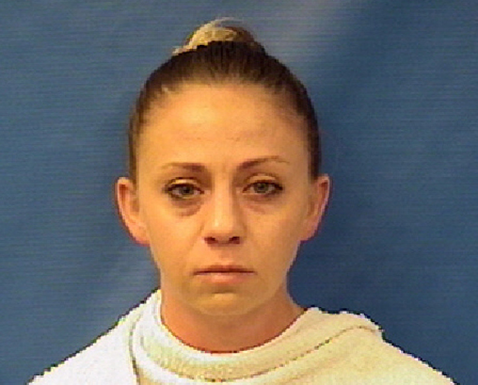 Dallas officer who killed neighbor claims door left ajar, large figure inside