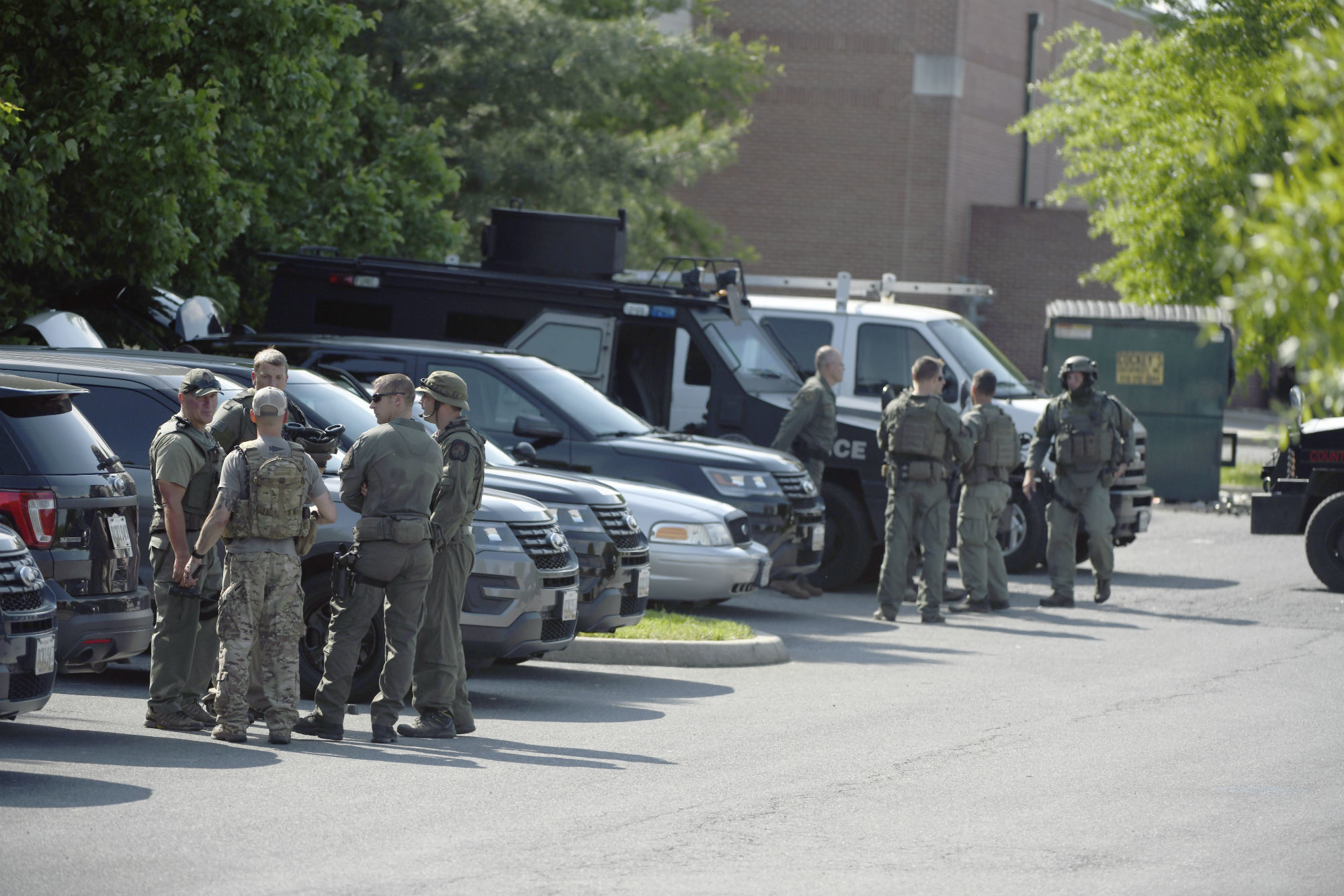 Female officer fatally injured in Maryland; police still searching for suspects