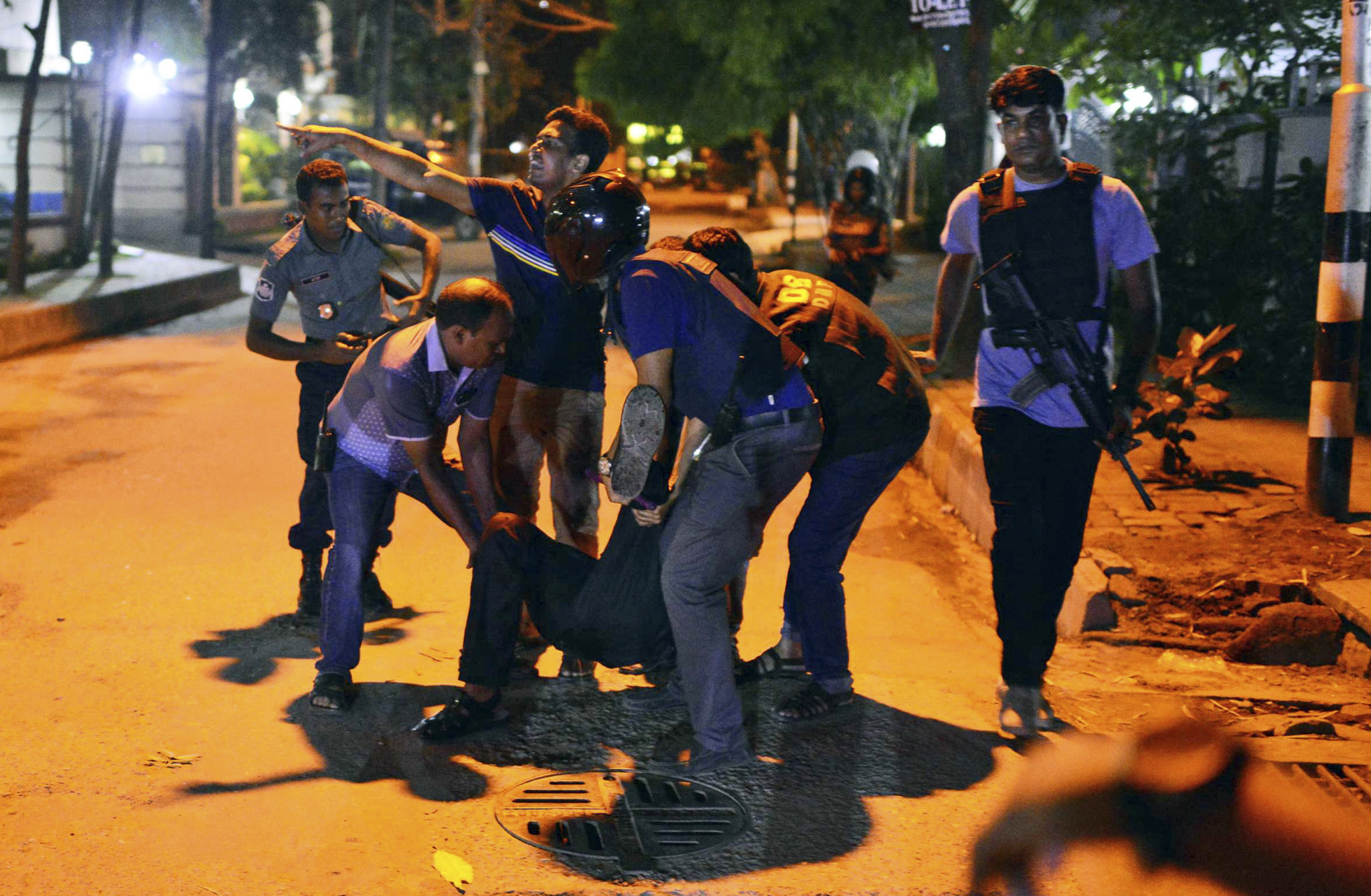 6 found dead as Bangladesh forces storm restaurant, free 13 hostages
