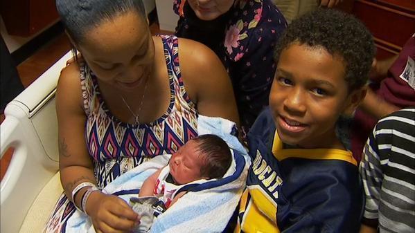 Georgia boy, 11, helps deliver mom's baby after telling 911, 'She needs somebody'