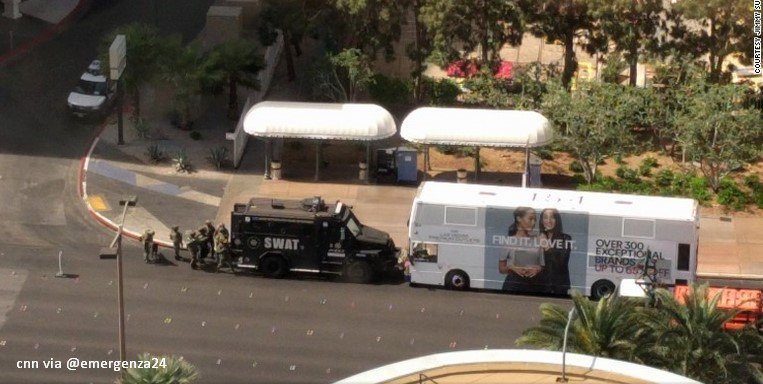 Part of Las Vegas Strip closed; police in standoff after 1 shot dead and another injured