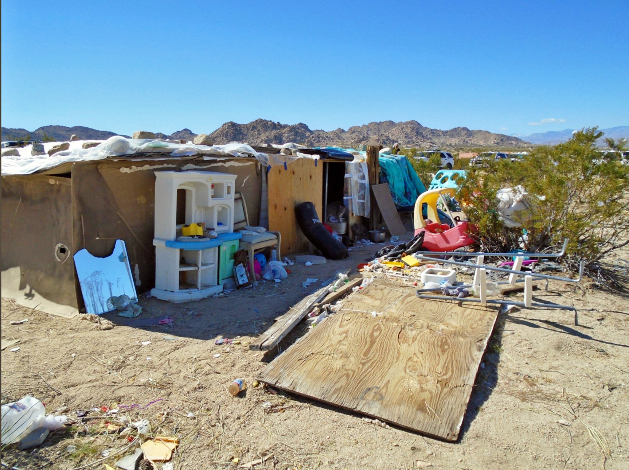 California couple arrested after 3 children found living in plywood hovel for years
