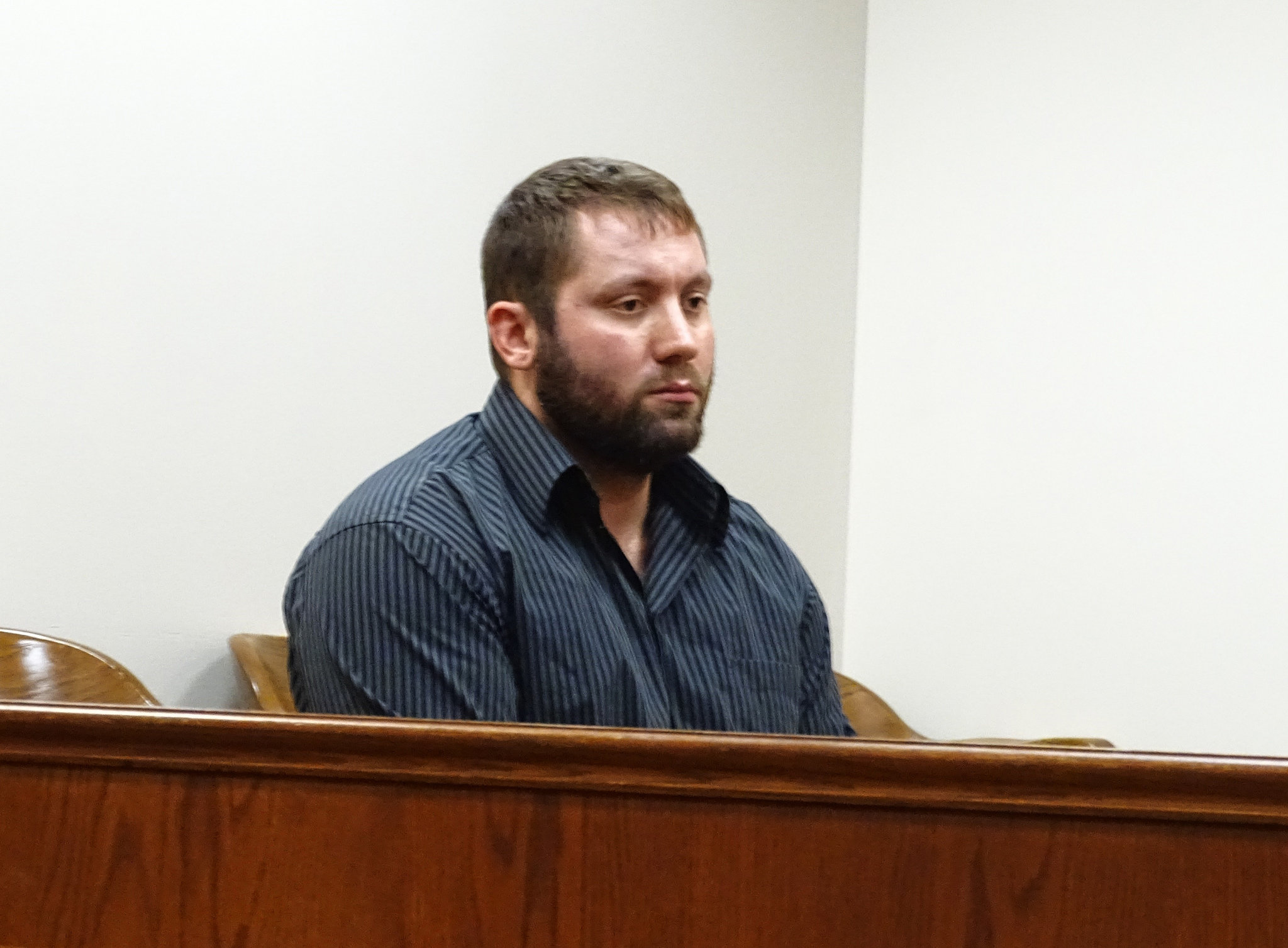 Ex-sheriff's deputy indicted in two separate Ohio killings turns himself in