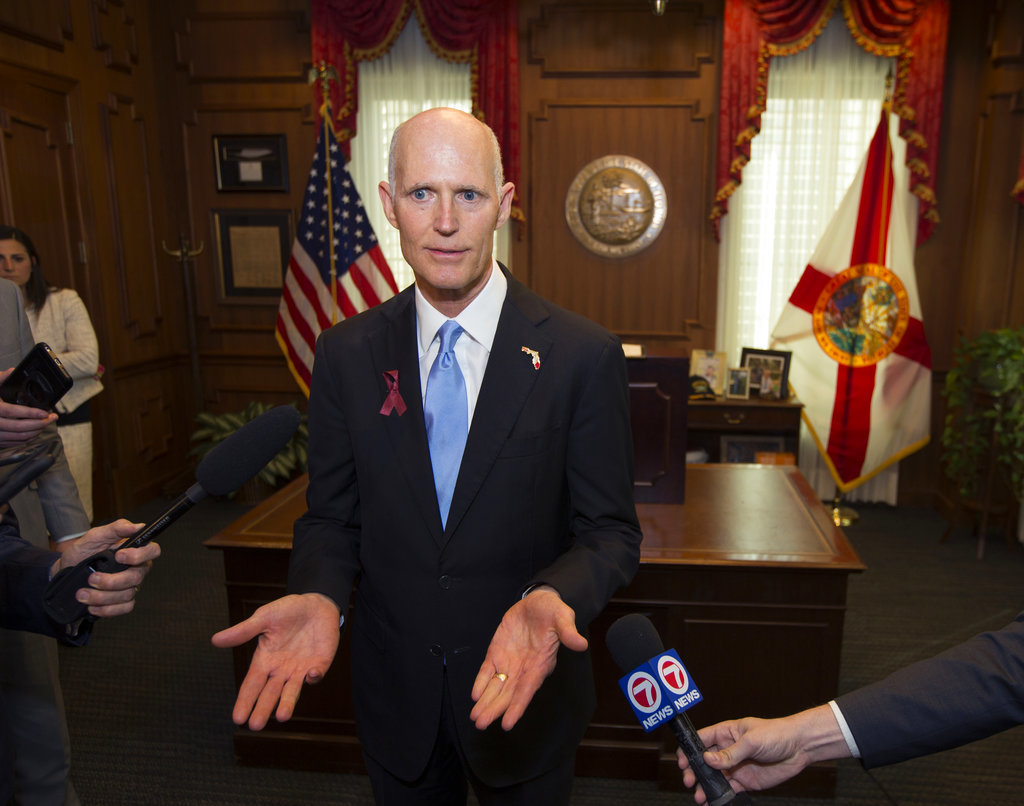 Florida school shooting: NRA sues after Gov. Scott signs bill with gun restrictions
