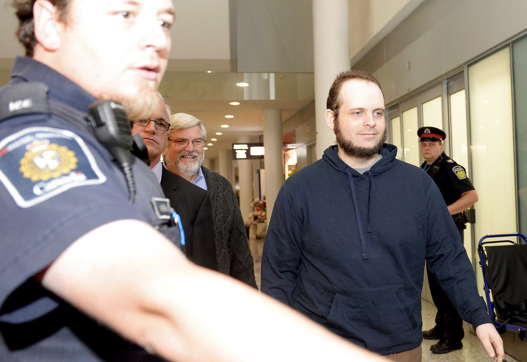 Ex-hostages arrive in Canada; husband says Afghan captors raped wife, killed their baby