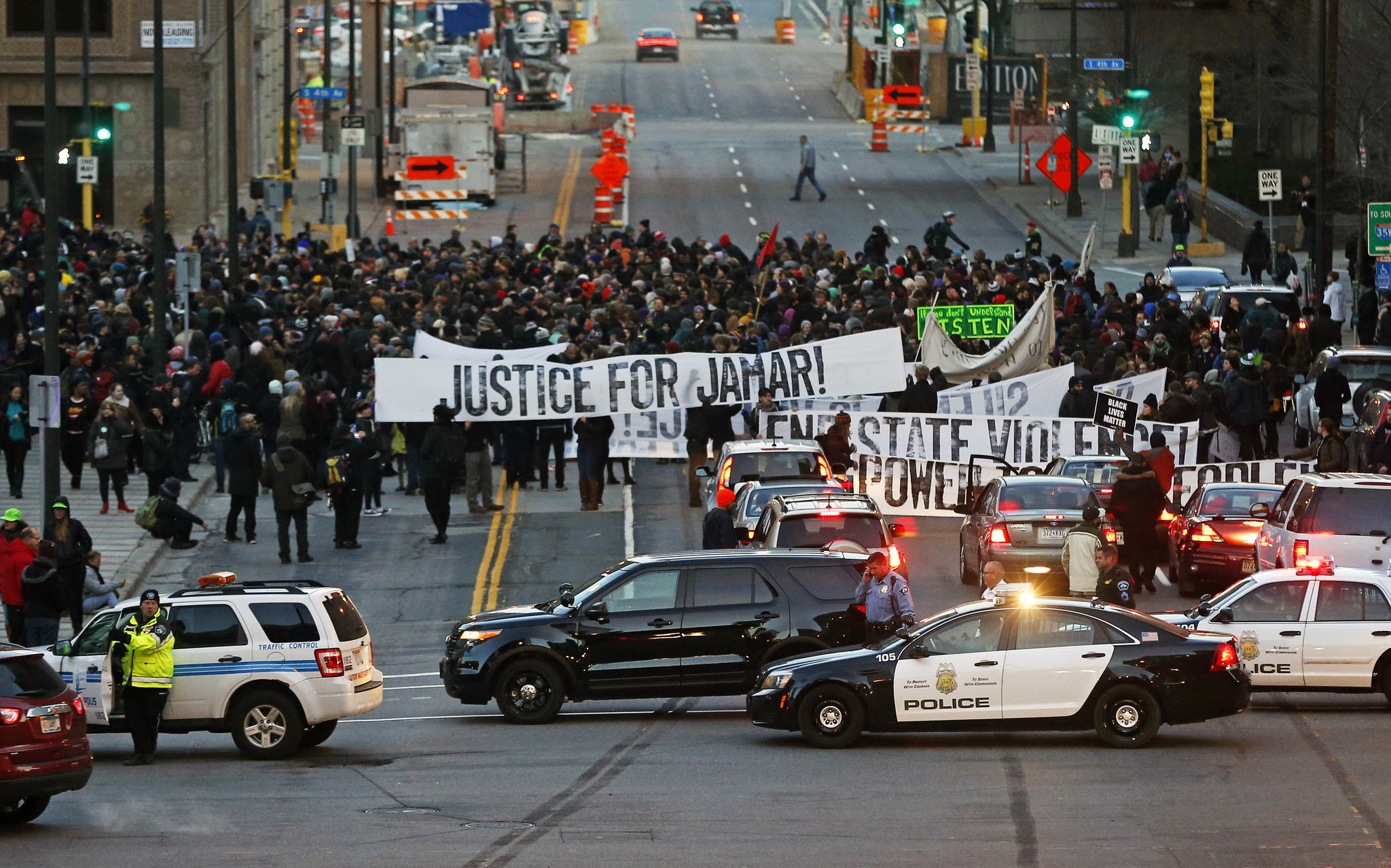Minneapolis protesters asked people to leave moments before shots rang out, injuring 5