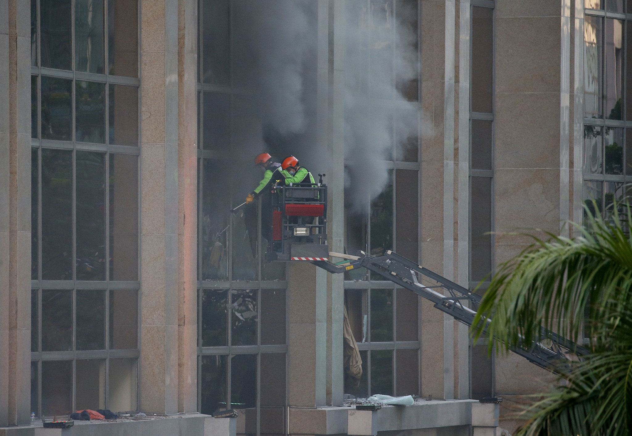 36 die in choking smoke at Philippine casino after gunman sets fire to tables