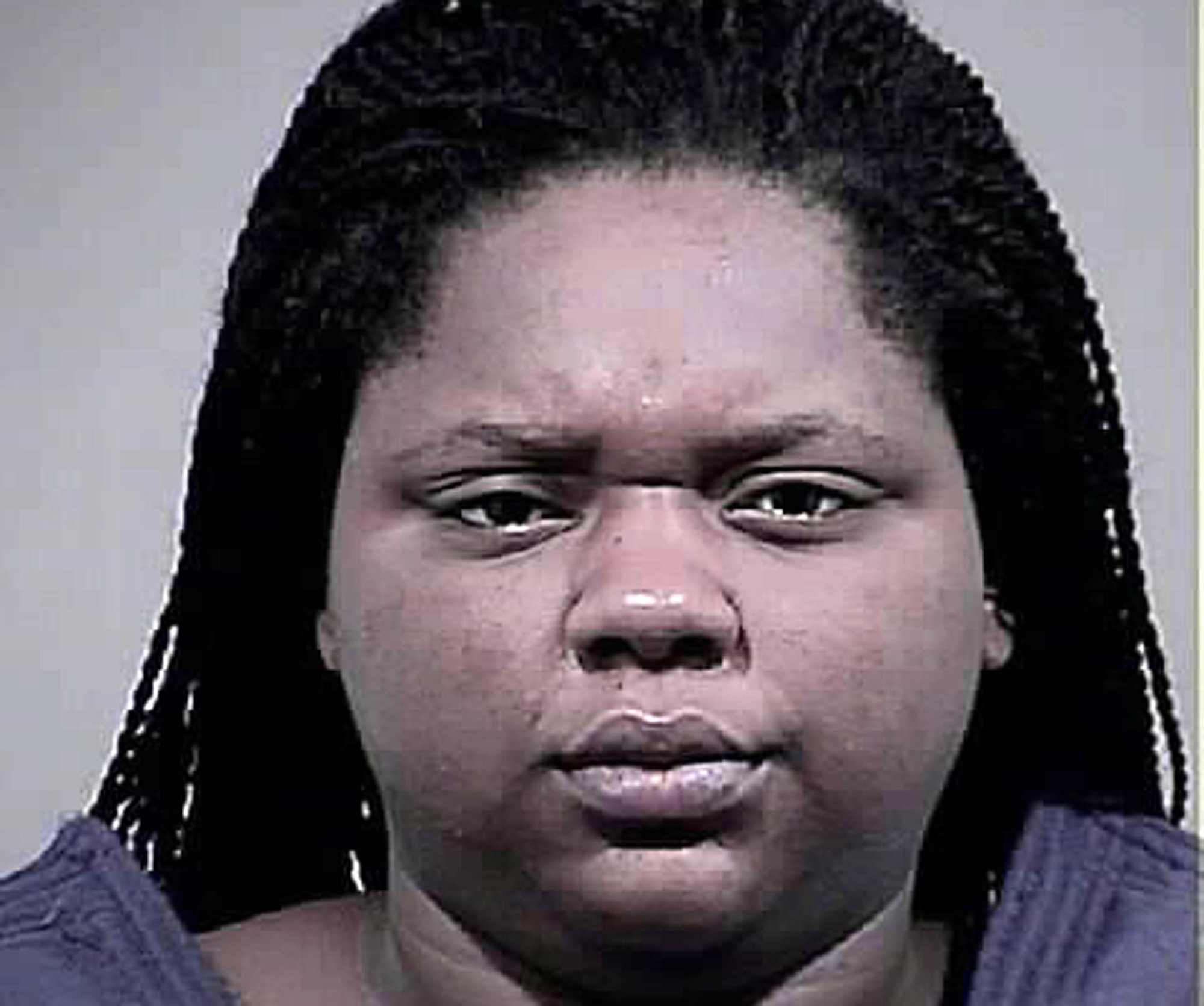 Woman found pushing dead son in swing charged with manslaughter