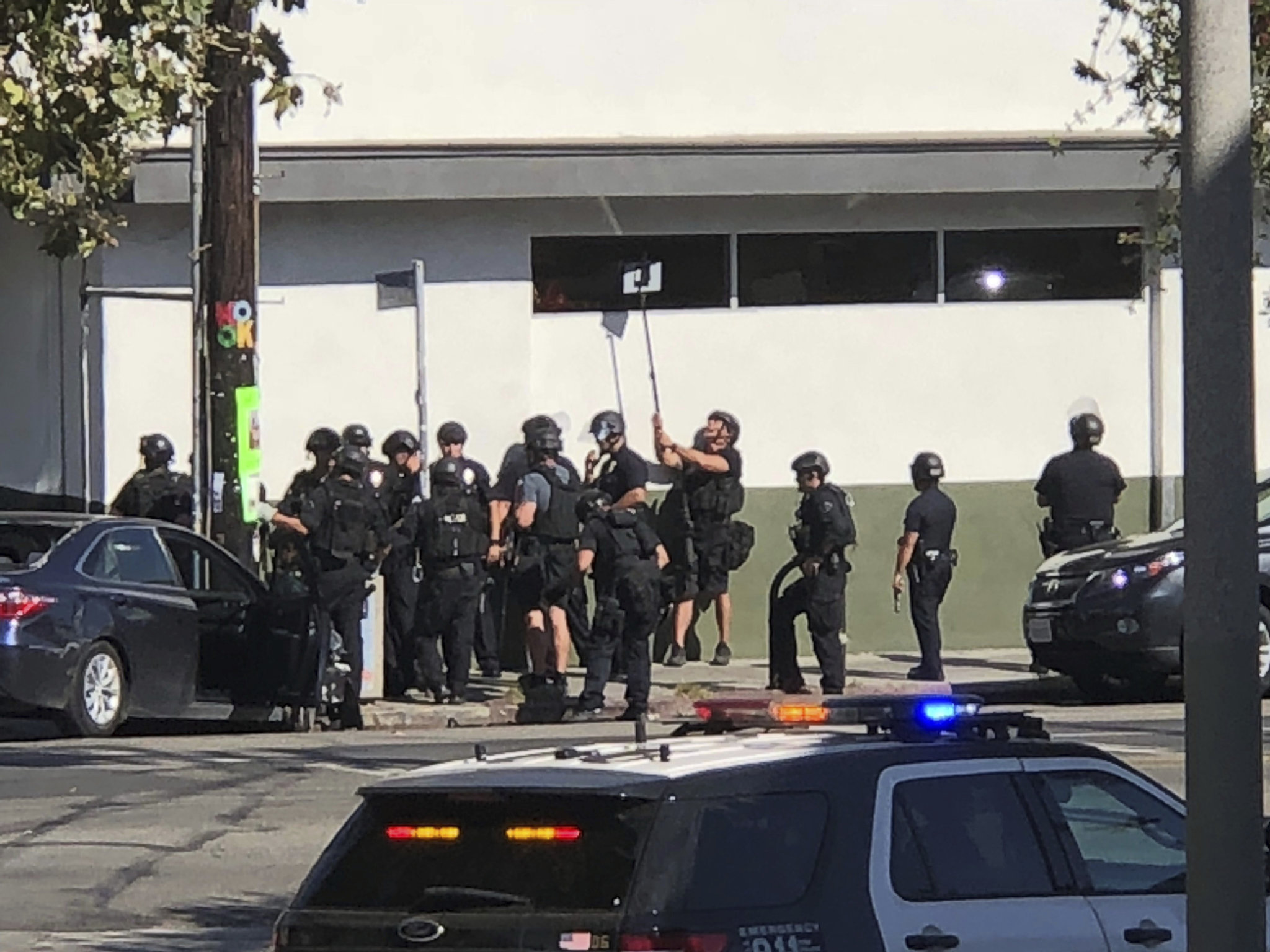 Suspect in Trader Joe's standoff surrenders in Los Angeles after woman in store killed