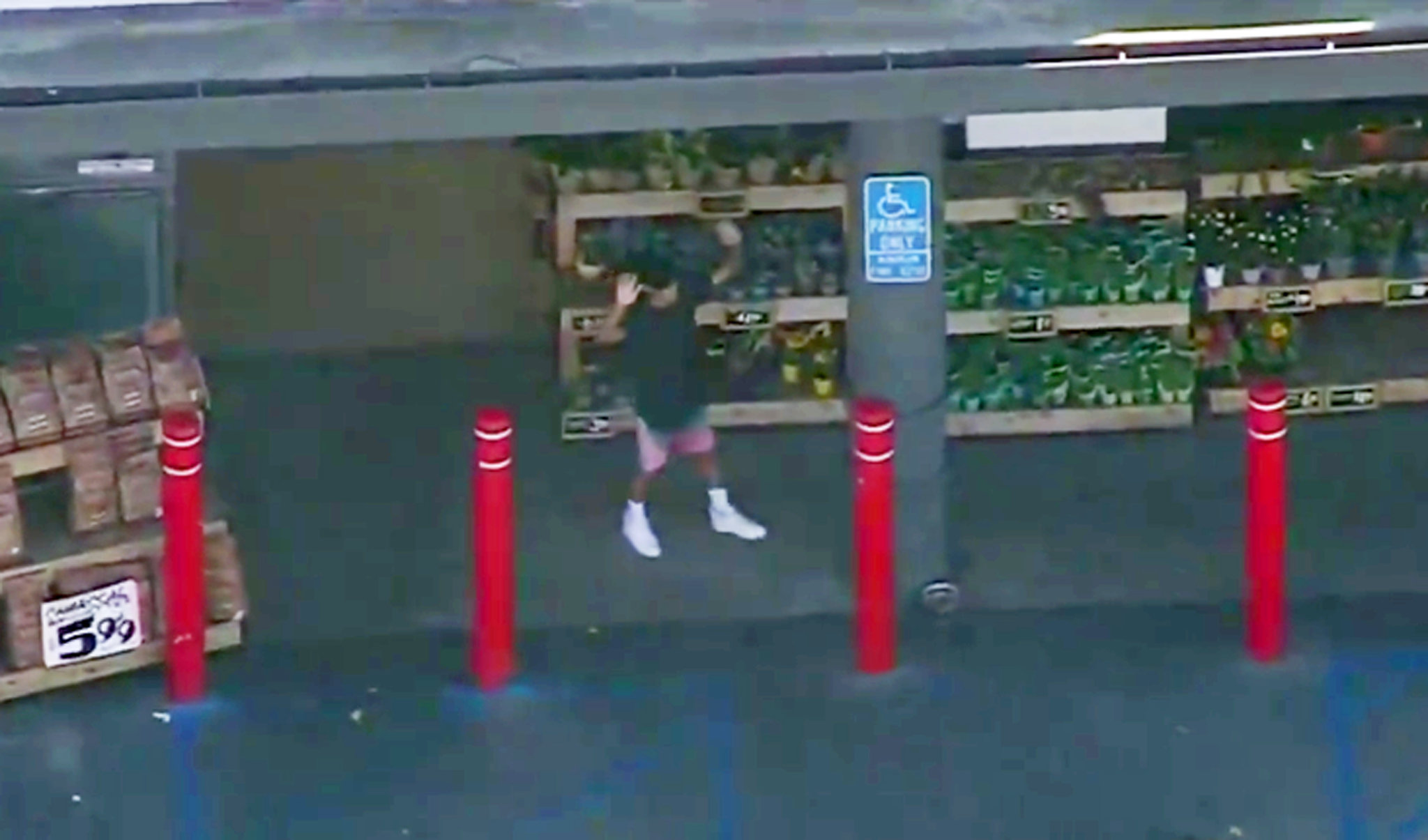 Suspect in Trader Joe's standoff surrenders in L.A. after woman killed, hostages taken
