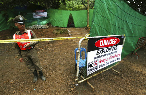 Thai cave rescue underway with 18 divers set to escort boys and coach to safety
