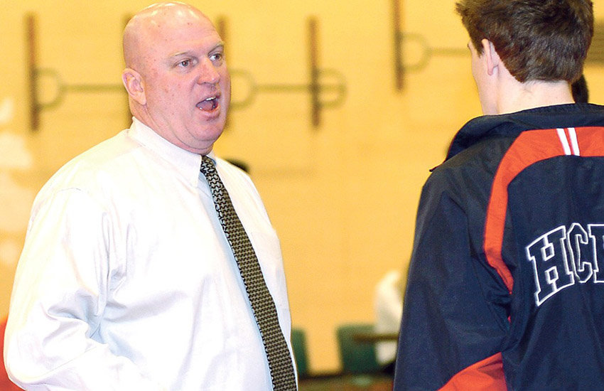 Legendary H.S. wrestling coach files federal suit over firing