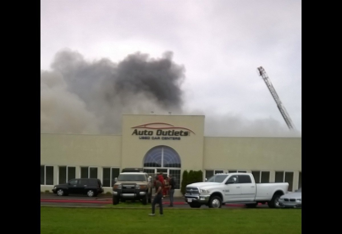 Firefighters battle blaze at Wolcott car dealership