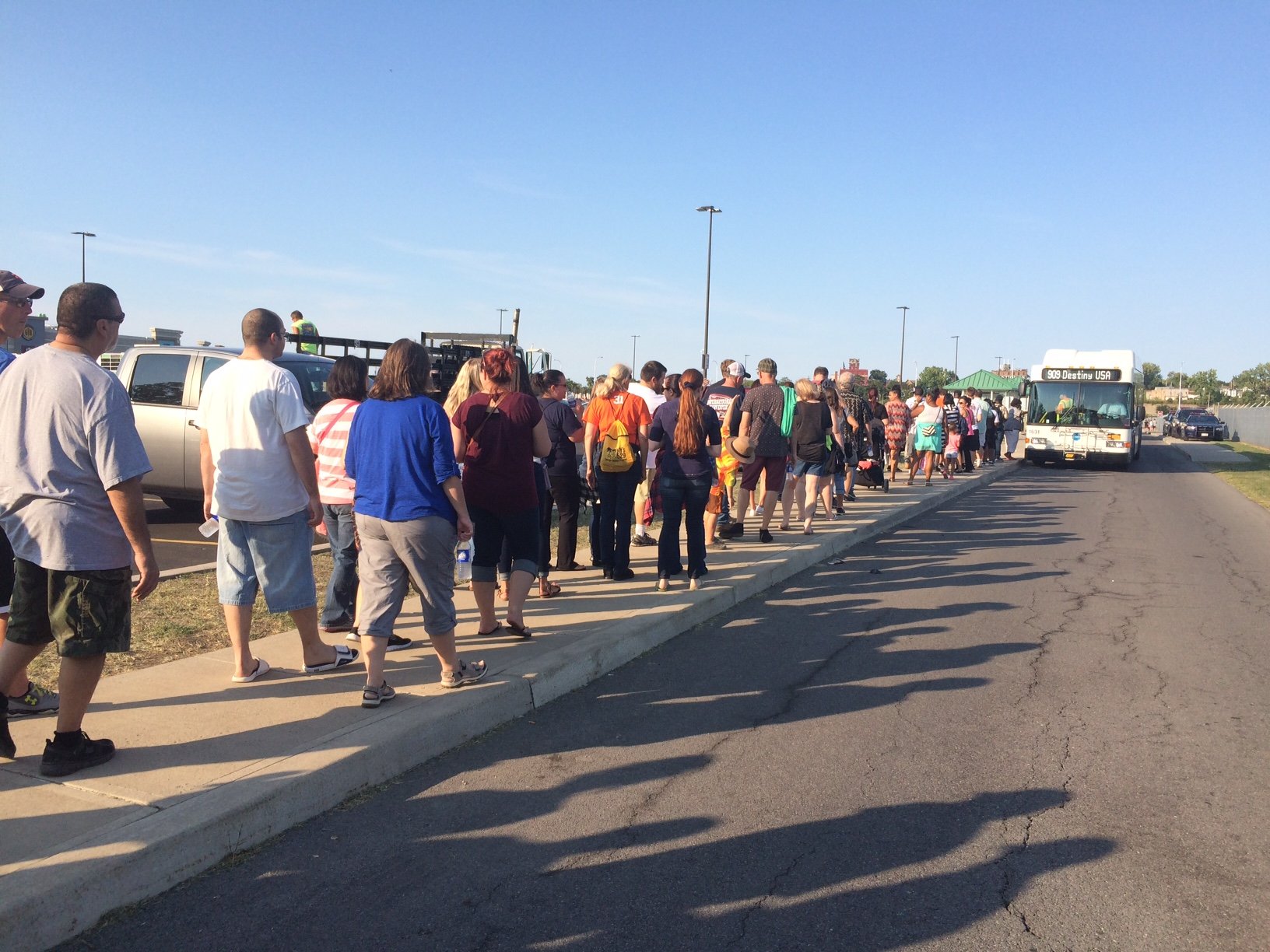 NYS Fair director hands out free water to people waiting for buses to