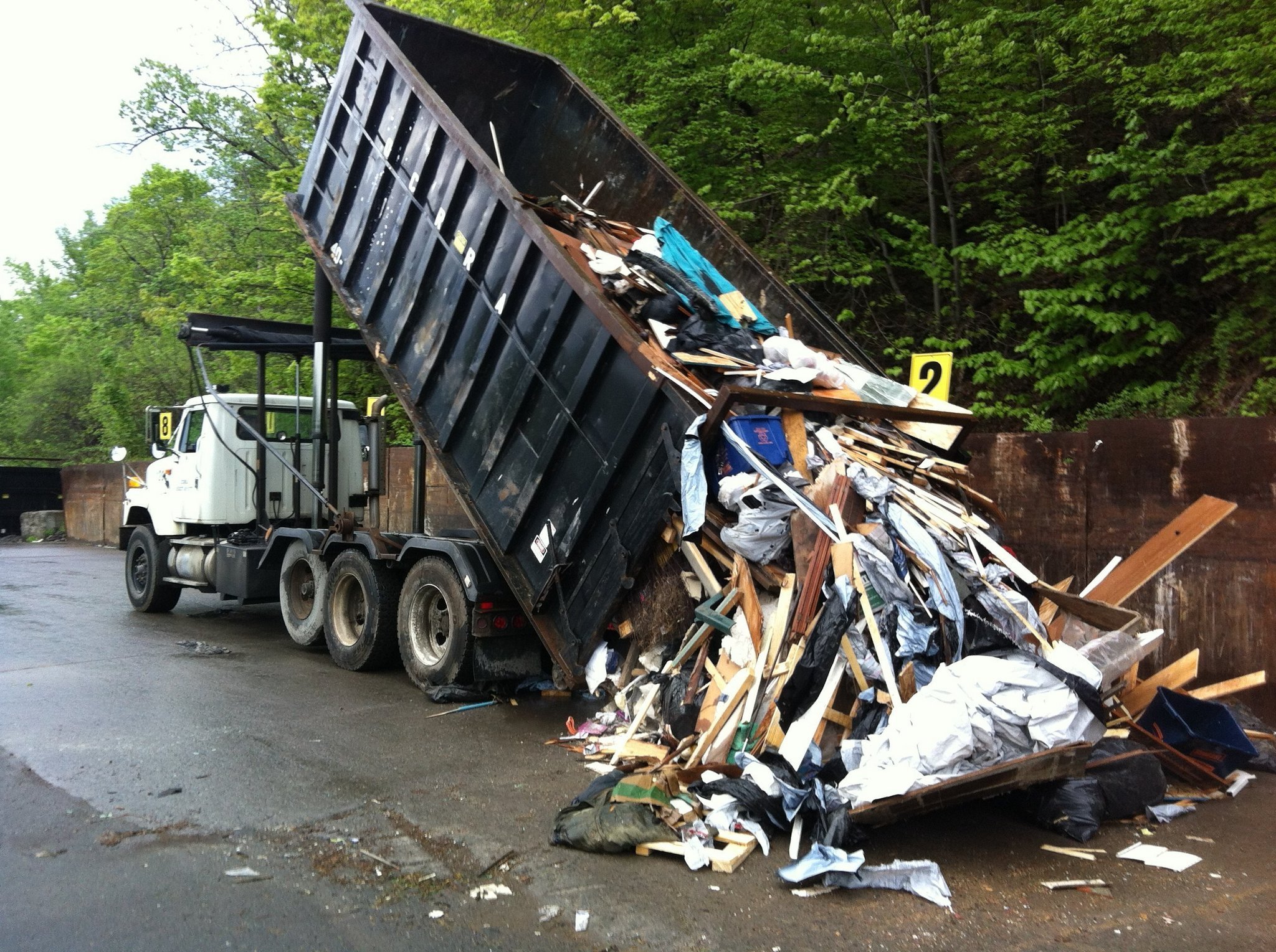Don't drive like trash: It's now illegal to speed past garbage trucks in NYS