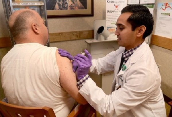 NY says flu is widespread in state, orders unvaccinated health workers to wear masks