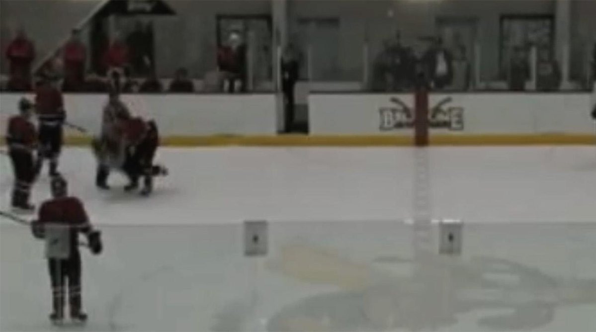 Erie Community College hockey player leaves penalty box, attacks referee (video)