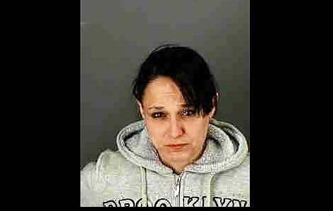 Utica woman charged with strangling 9-year-old