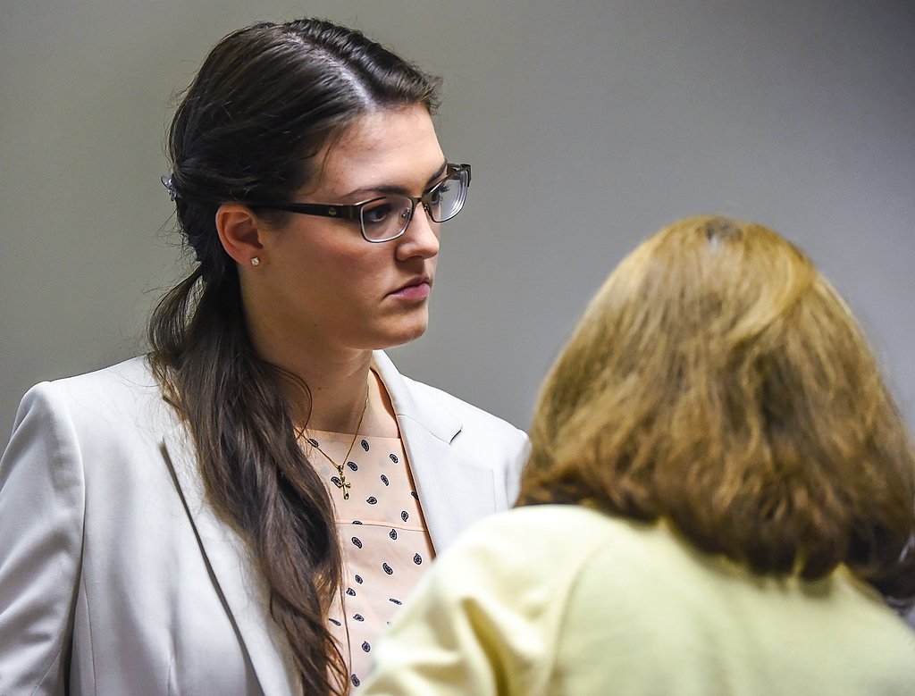 Kaitlyn Conley, accused of killing boss, slept with victim's son after memorial, son says