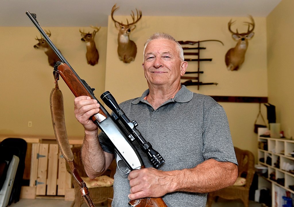 Don W. Hall, of Taberg. NY, poses with his Remington 742 30-06, one of the guns taken by the Sheriff Department. Ellen M. Blalock | eblalock@syracuse.com