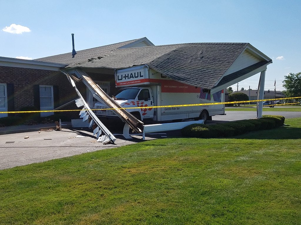 Not quite enough room: U-Haul truck hits CNY funeral home; driver flees