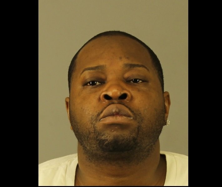 Driver charged after police dog finds large quantity of cocaine, heroin in hidden compartment, cops say