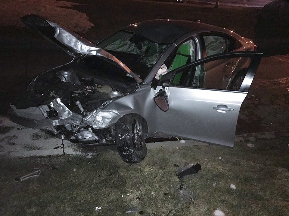 Drunk driver crashes into wall in front of Utica National Insurance building, police say