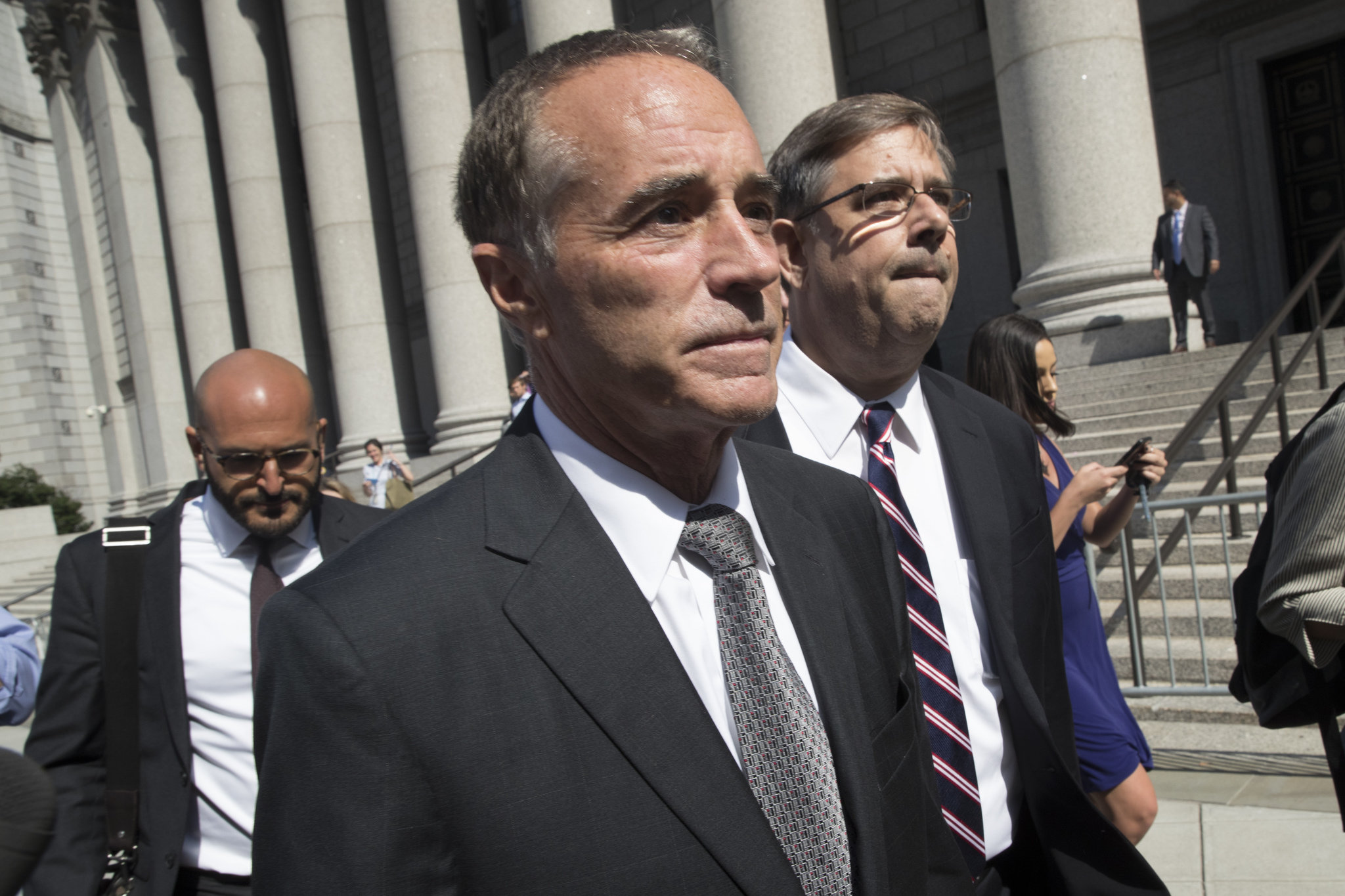 Rep. Chris Collins denies insider-trading charges, says he'll remain on ballot