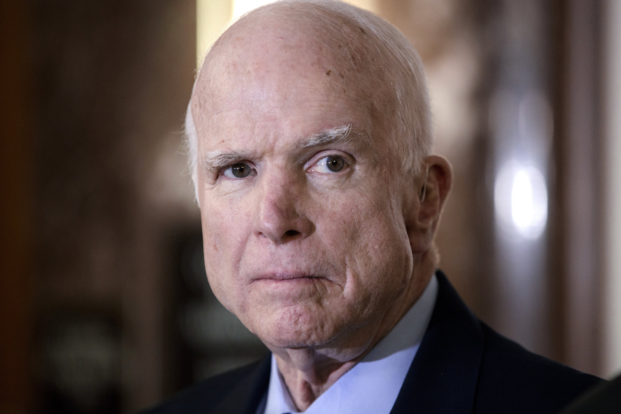 Trump, critic of John McCain, will sign bill honoring him at Fort Drum