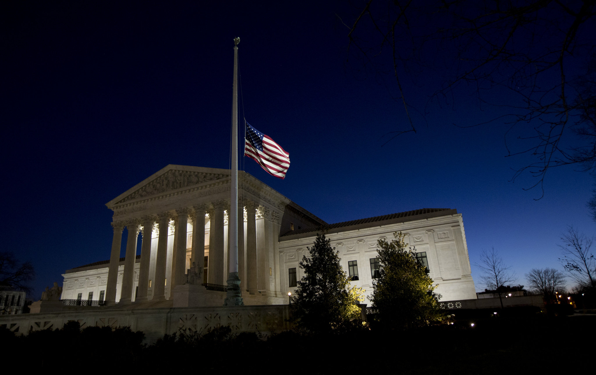 Flags at half-staff in honor of Justice Antonin Scalia; political fight over vacancy heats up