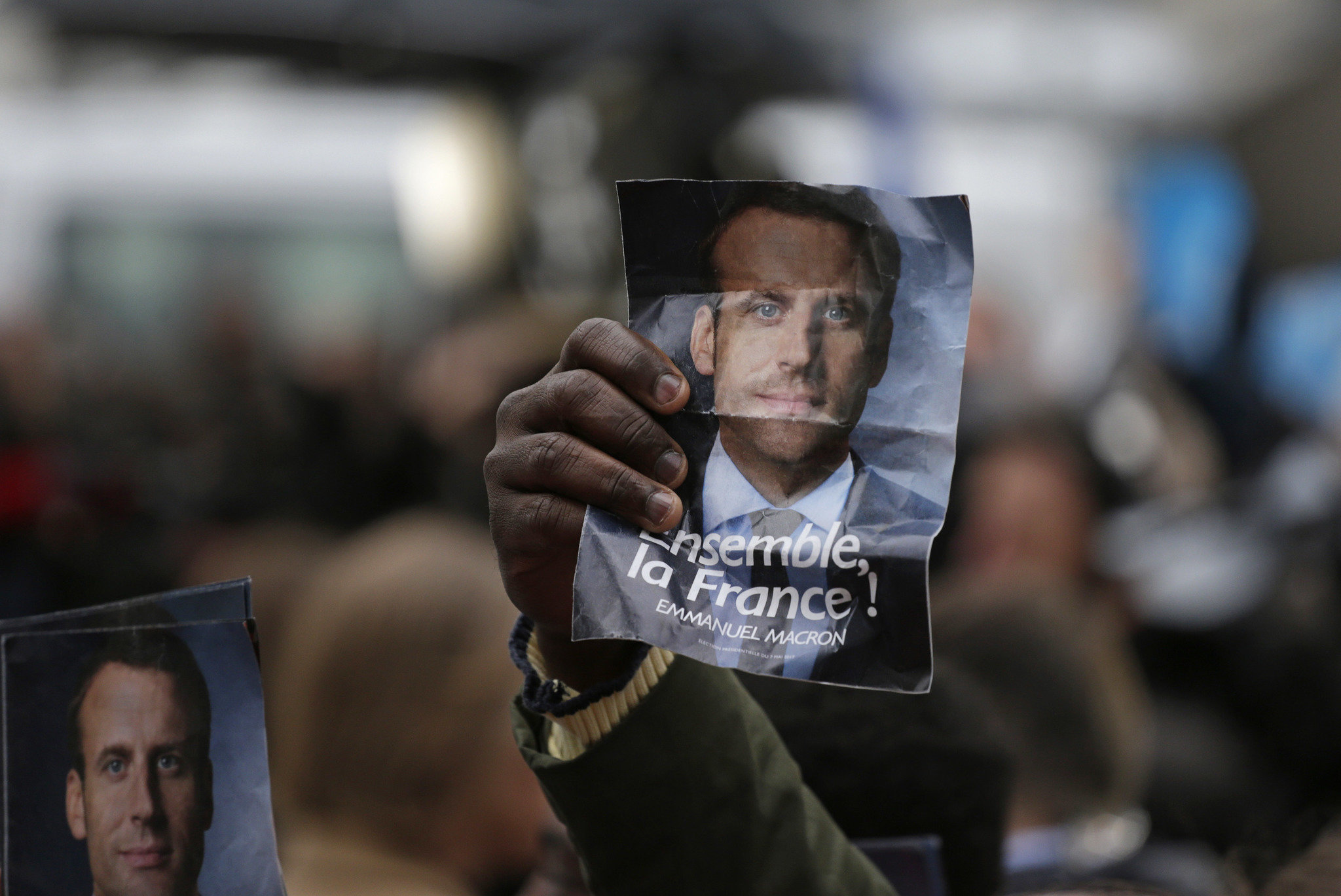 Emmanuel Macron wins French election, projections show